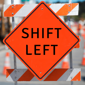 Traffic caution sign that reads "shift left"